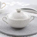 Embossed covered porcelain bowl for elegant dining and table presentation