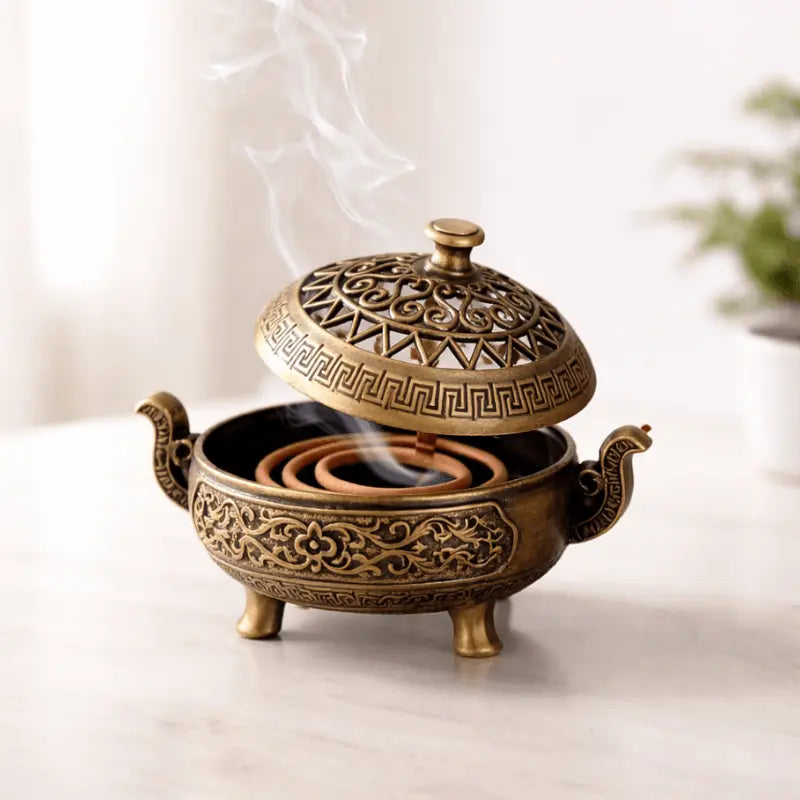 Vintage metal incense burner with decorative tripod design for home décor